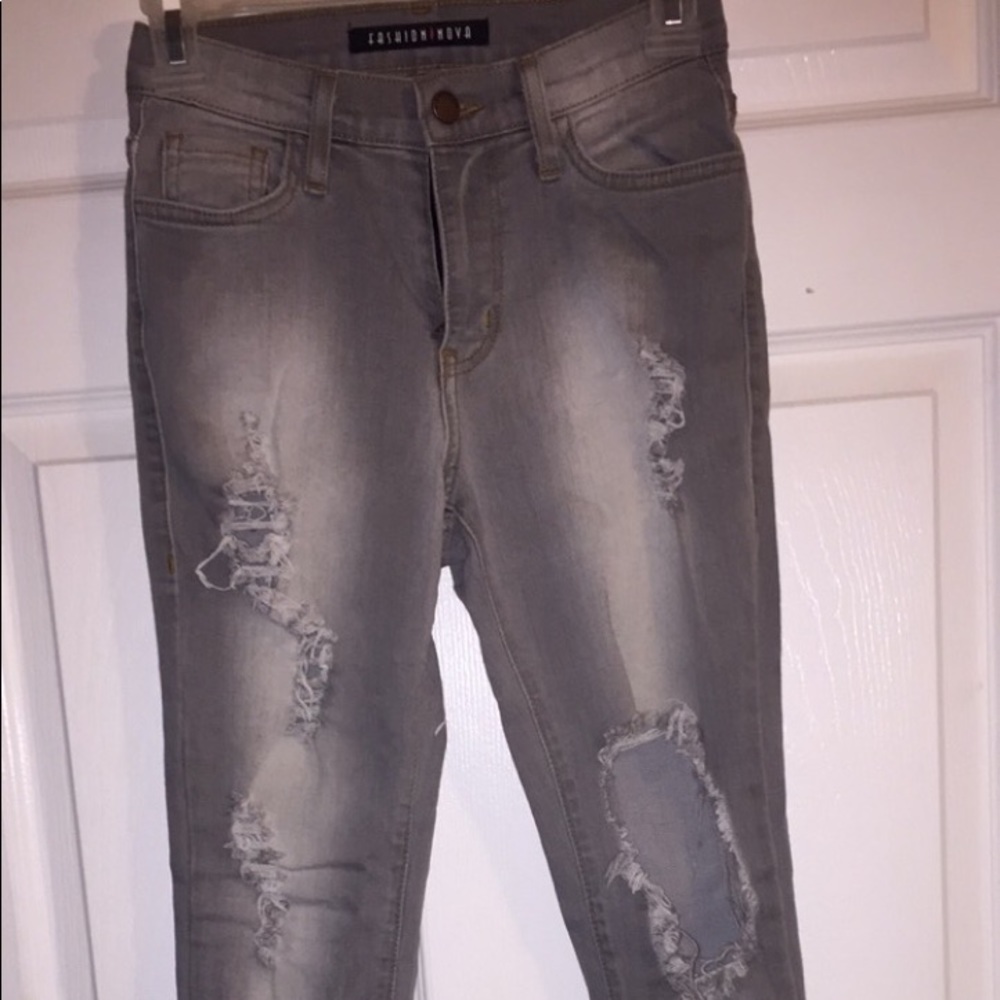 FashionNova high waisted ripped skinny jeans.